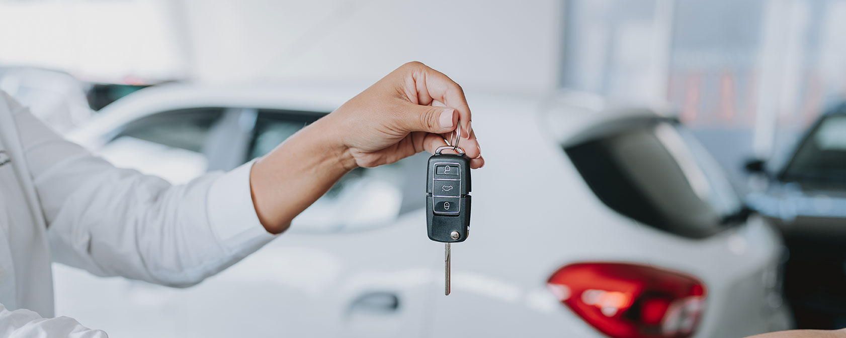 hand holding car keys